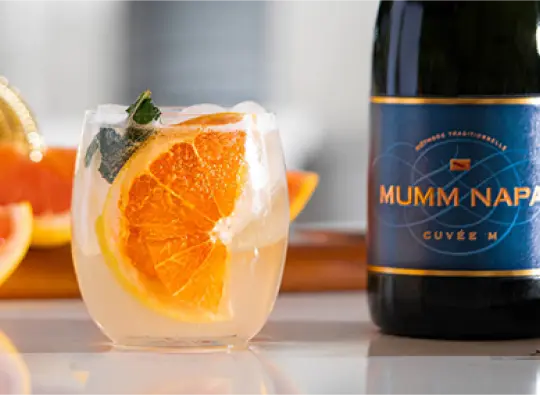 Sunrise Spritz cocktail made from Mumm Napa Cuvée M