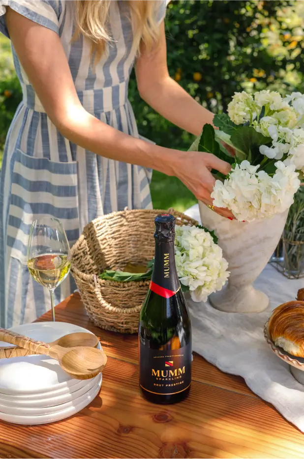 Mumm Sparkling Brut Prestige set on a table ready to be served